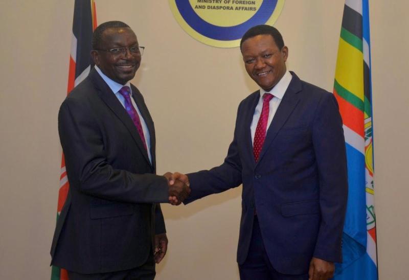 File image of CS Alfred Mutua and Emmanuel Juma.